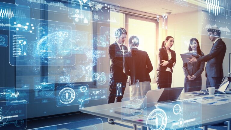 Team discussing data on transparent digital screen in modern office